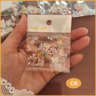 (C) إكسسوار الأظافر